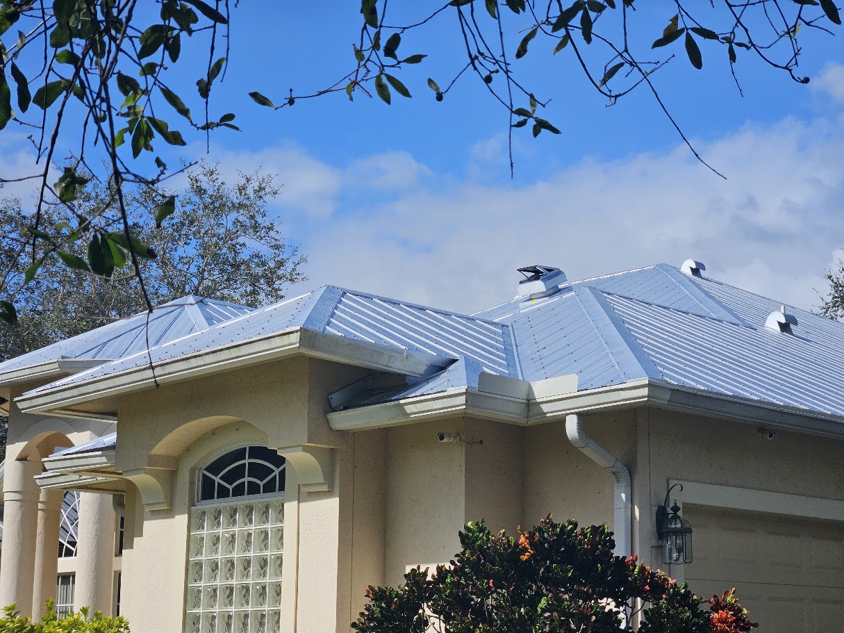 5V metal roof panel showing crimp ribs and sealed fasteners