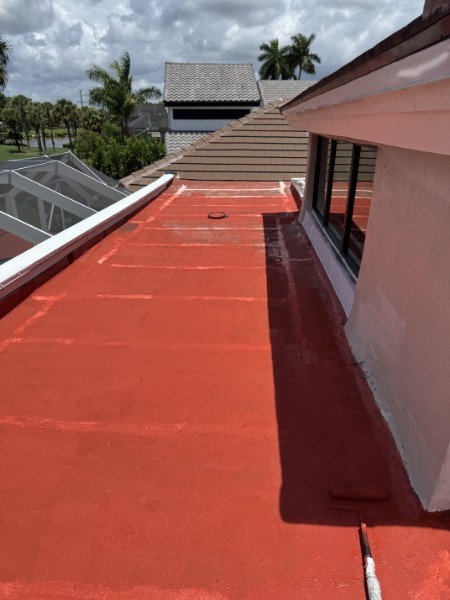 Reinforced seam detail on a silicone roof restoration