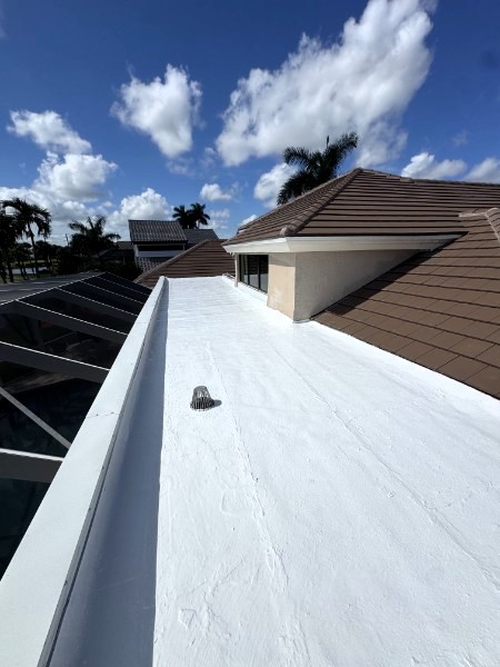 Same Florida flat roof after seamless silicone coating restoration
