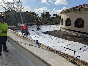 Storm damage to a Florida roof documented by Expert Roofing Services